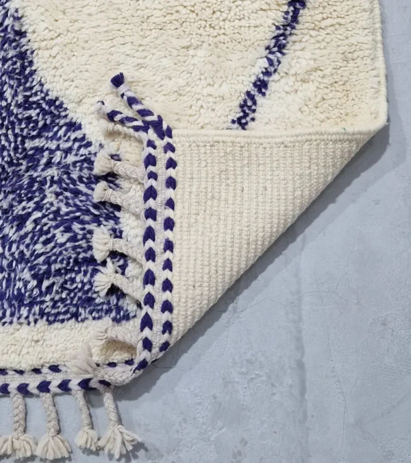 Detailed View of Toda handmade Beni Ourain wool rug with a modern organic abstract design in blue and beige