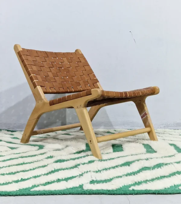 Verdant handmade Beni Ourain wool rug with a bold pattern of nested green and ivory stripes in room