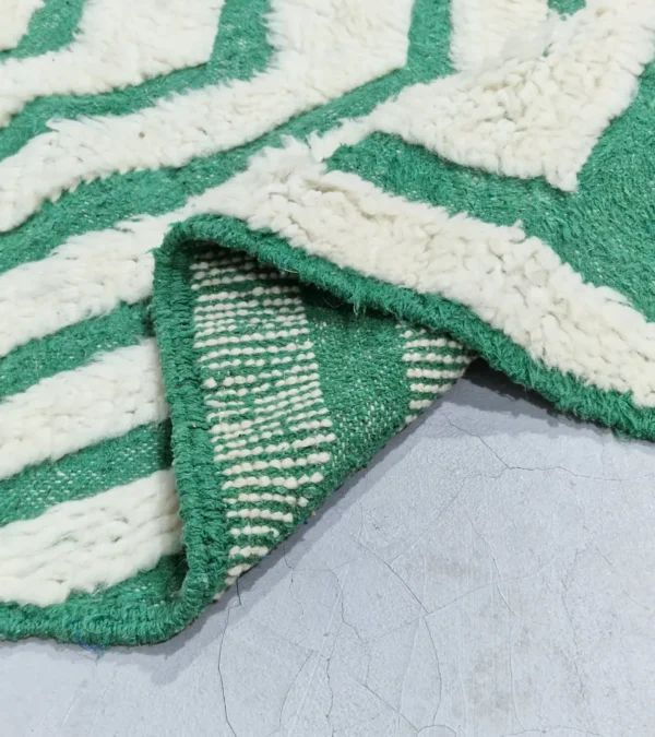 Detailed View of Verdant handmade Beni Ourain wool rug with a bold pattern of nested green and ivory stripes