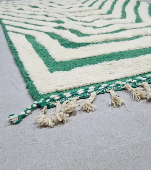 Detailed View of Verdant handmade Beni Ourain wool rug with a bold pattern of nested green and ivory stripes