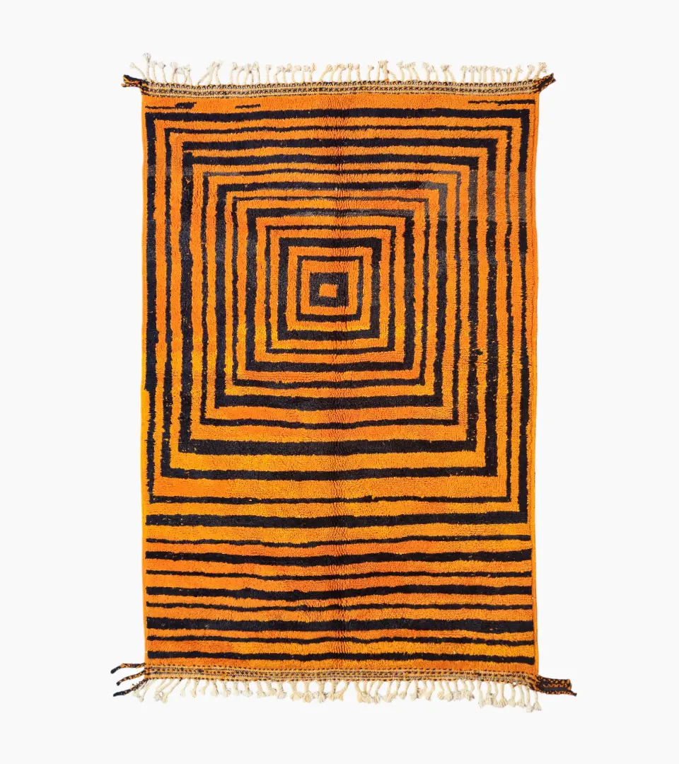 Top View of Handmade Moroccan wool rug with orange and navy concentric square stripes
