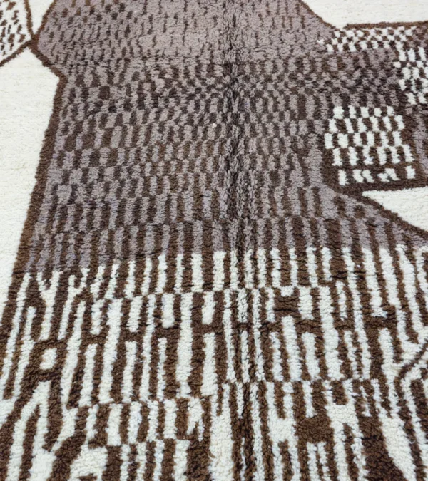 Detailed View of Zira handmade Beni Ourain wool rug with a textured geometric design in brown, gray, and ivory