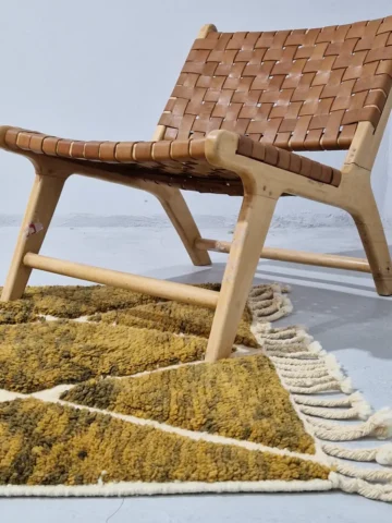 Zola handmade Moroccan wool rug with a modern lattice pattern in brown and ivory in room