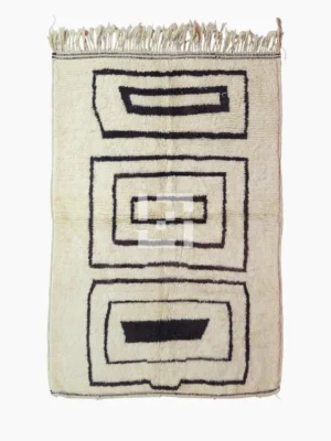 Top View of Zola handmade Beni Ourain wool rug with a minimalist design of bold black lines on an ivory background