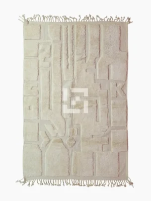 Top View of Zuri handmade Beni Ourain wool rug with an abstract high-low pile design on a neutral ivory background