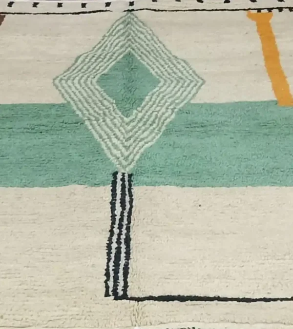 Handmade Moroccan rug with modern geometric diamond design in green, beige, rust, and mustard – Jaadzana