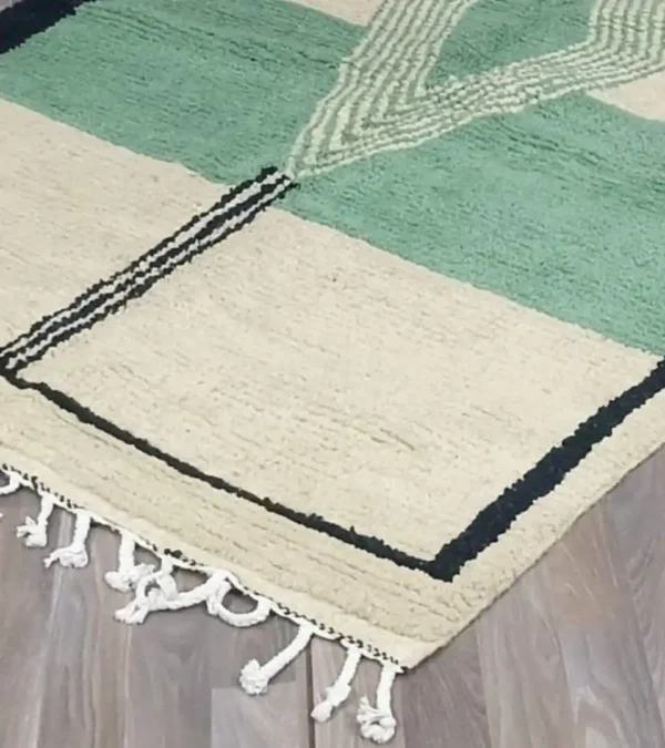 Handmade Moroccan rug with modern geometric diamond design in green, beige, rust, and mustard – Jaadzana