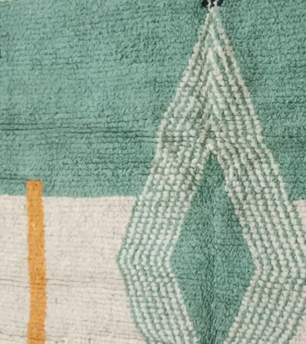Handmade Moroccan rug with modern geometric diamond design in green, beige, rust, and mustard – Jaadzana