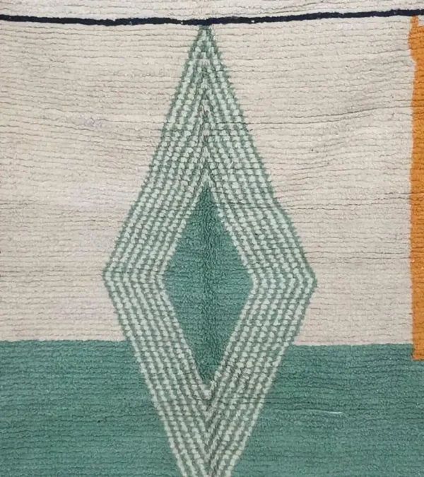 Handmade Moroccan rug with modern geometric diamond design in green, beige, rust, and mustard – Jaadzana
