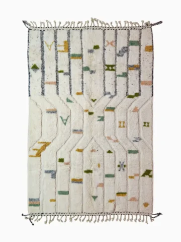 top view of Handmade bohemian wool rug with an abstract striped pattern on a high pile