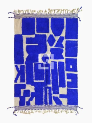 top view of Handwoven cobalt blue abstract geometric Moroccan rug with shaggy pile