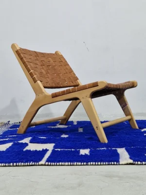 Handwoven cobalt blue abstract geometric Moroccan rug with shaggy pile in room