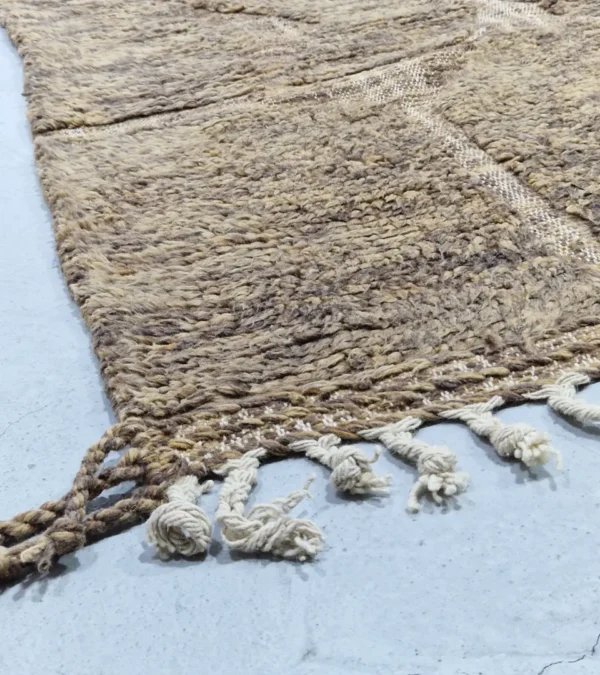 detailed view of Handwoven earth gray wool rug with subtle geometric grid pattern