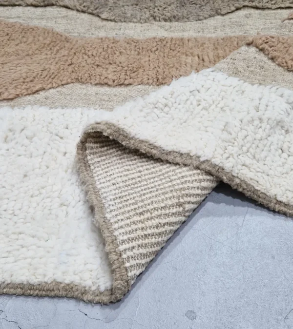 detailed view of Handmade Moroccan high/low pile rug with abstract neutral pattern