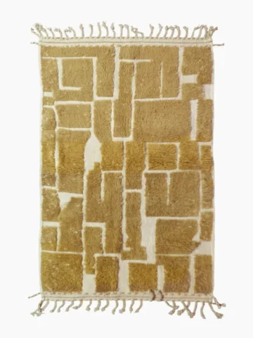 top view of Golden brown geometric Moroccan rug with creamy off-white wool background