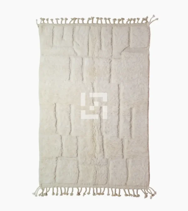 top view of Handcrafted ivory Moroccan rug with sculpted high-low grid design and fringe tassels