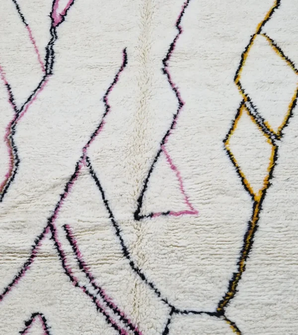 detailed view of Handmade minimalist Moroccan wool rug with colorful abstract lines on a high pile