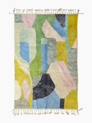 Top View of Liora handmade Beni Ourain wool rug with a vibrant abstract design in green, blue, yellow, and pink