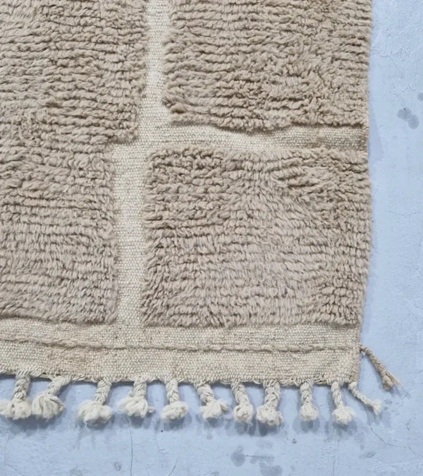 detailed view of Handmade Moroccan high/low pile rug with taupe geometric pattern