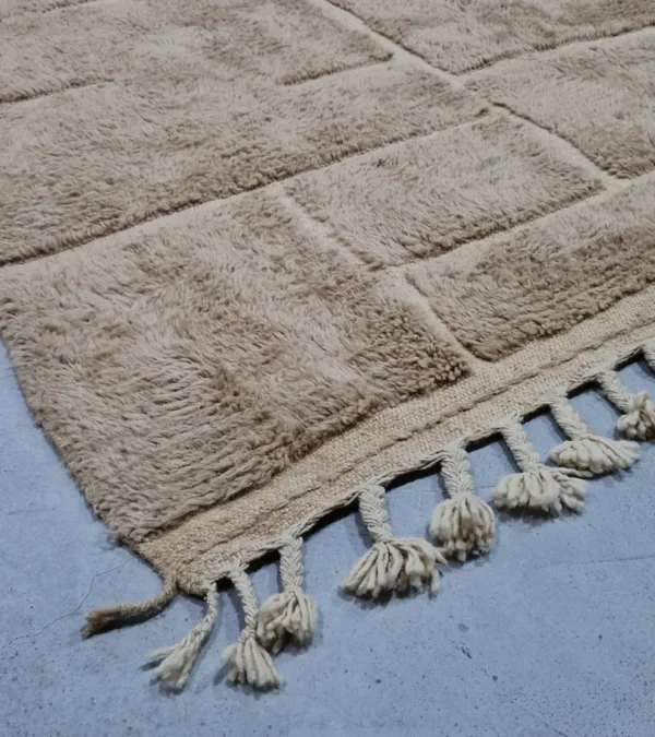 detailed view of Handmade Moroccan high/low pile rug with taupe geometric pattern