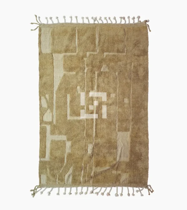 top view of Handmade Moroccan wool rug in sandy beige with sculpted off-white linework and tassels