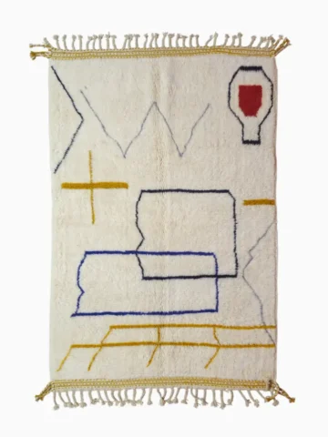 top view of Oslo handmade Azilal wool rug with a vibrant abstract, geometric design on a high pile