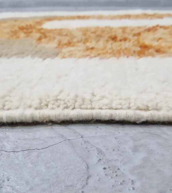zoomed in view of Custom size Moroccan rug with tassels, rust and beige modern design