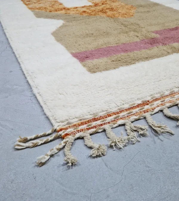 detailed view of Custom size Moroccan rug with tassels, rust and beige modern design