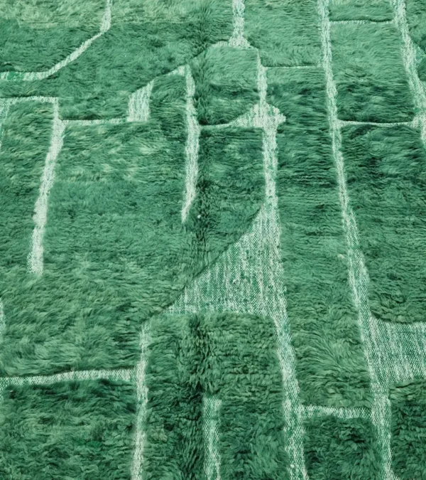 detailed view of Hand-knotted Moroccan wool rug with high-low geometric grid in green and off-white tones