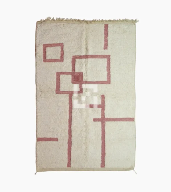 top view of Zola handmade Beni Ourain wool rug with a minimalist geometric design of pink lines and shapes on an ivory background