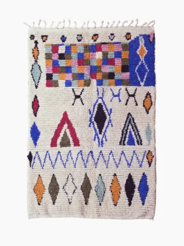 Hand knotted wool rug 5x7 ivory with colorful geometric pattern