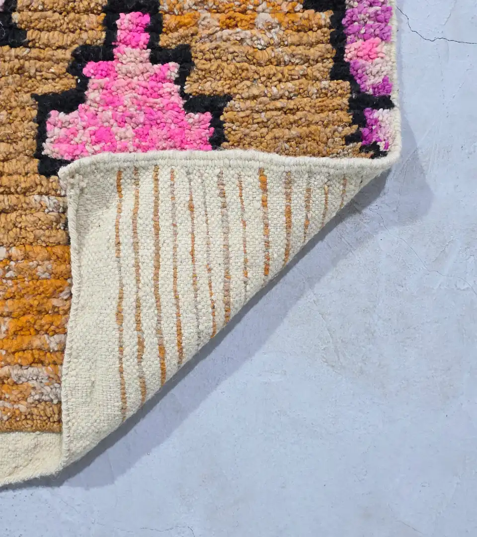 Small Moroccan wool rug with geometric pattern