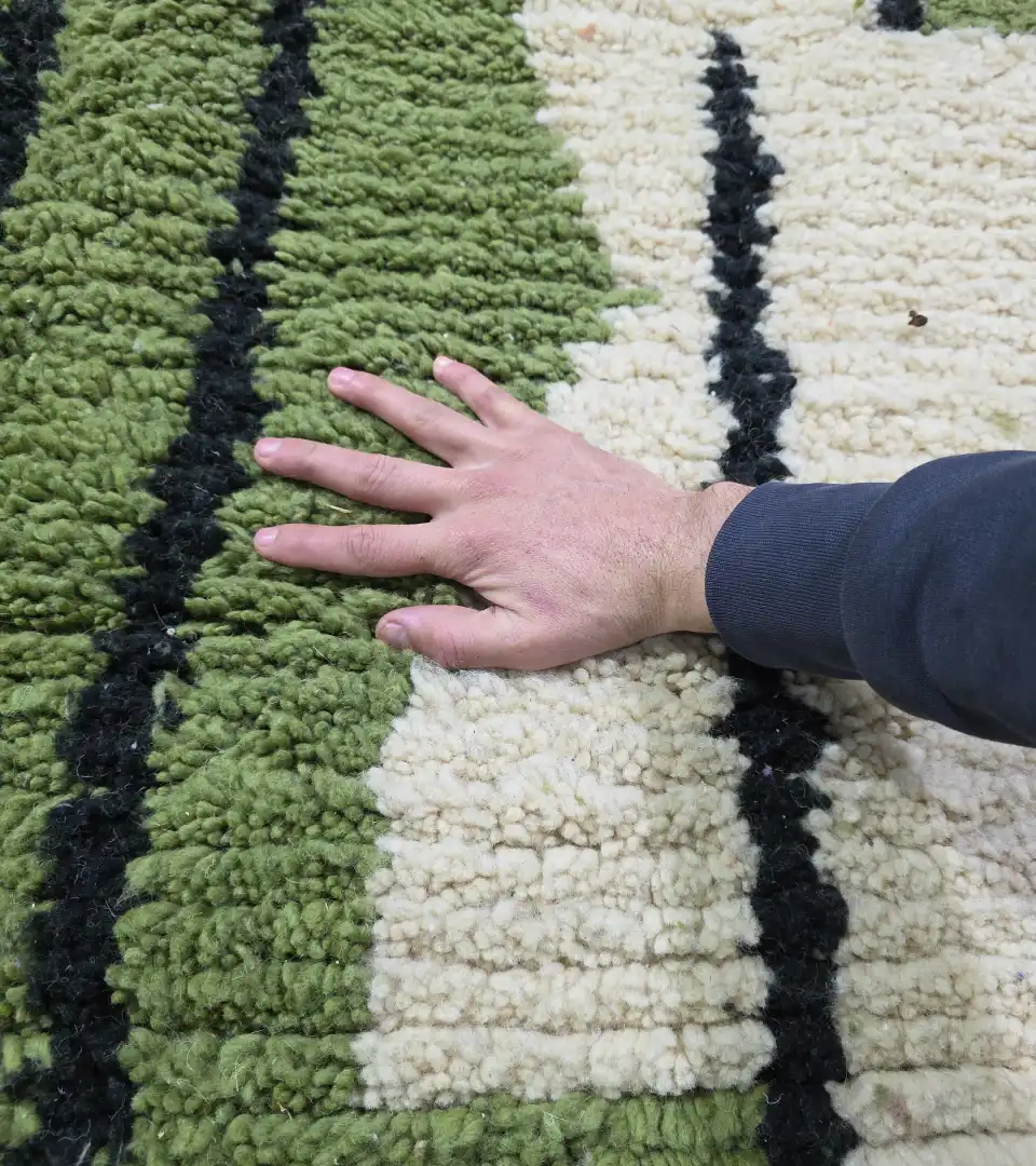 Artisan hand knotted wool rug in green tones