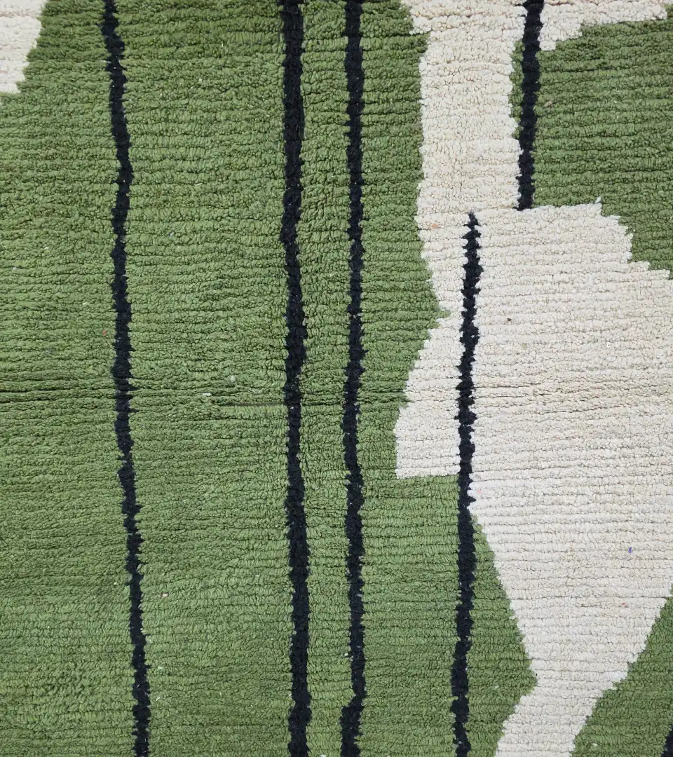 Artisan hand knotted wool rug in green tones