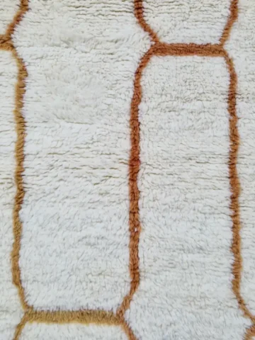 Ivory Moroccan wool runner rug with warm orange geometric pattern