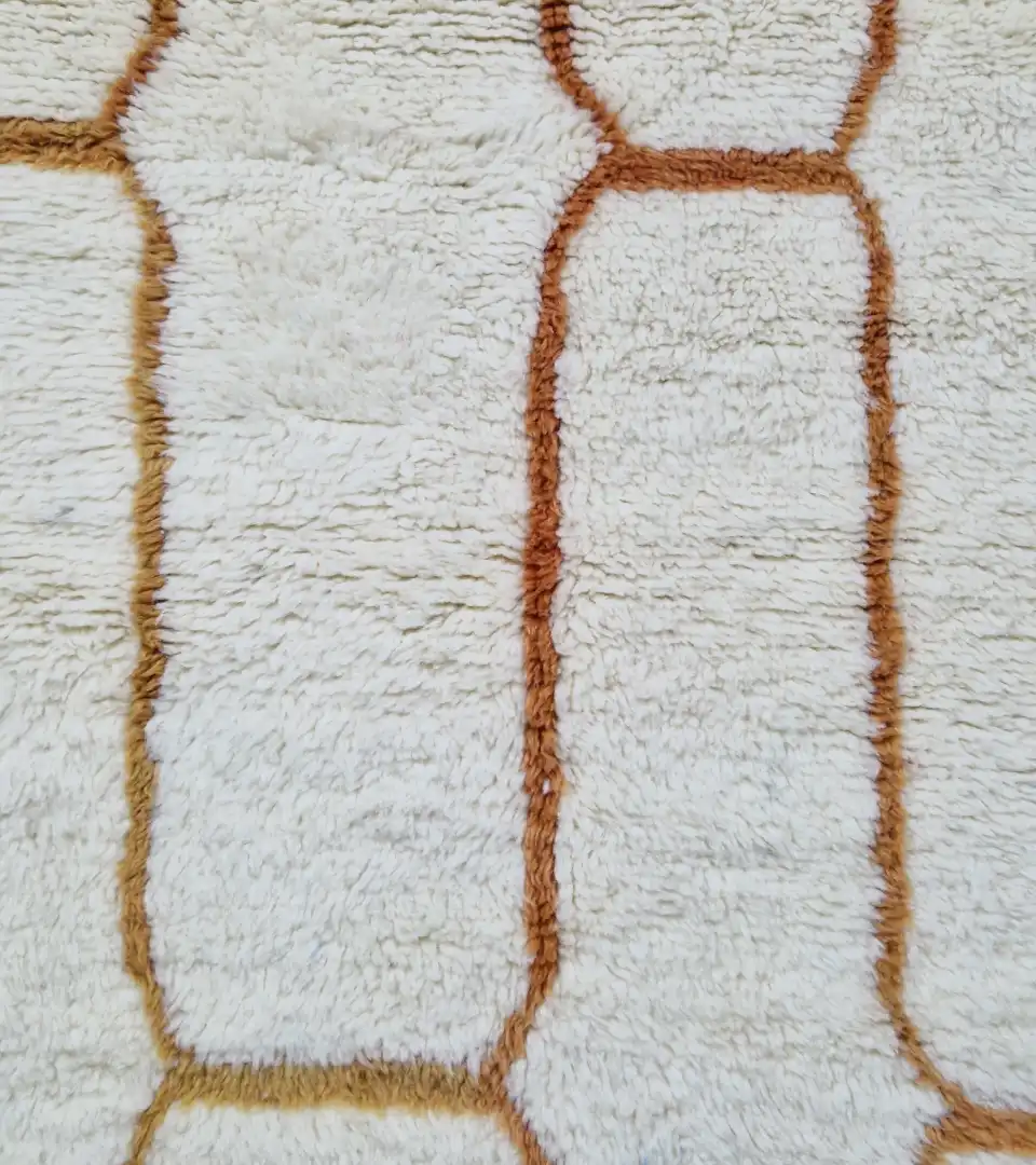 Ivory Moroccan wool runner rug with warm orange geometric pattern