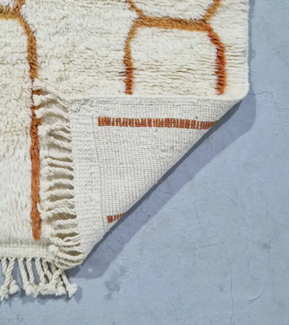 Modern ivory and orange Moroccan runner rug with linear chain design