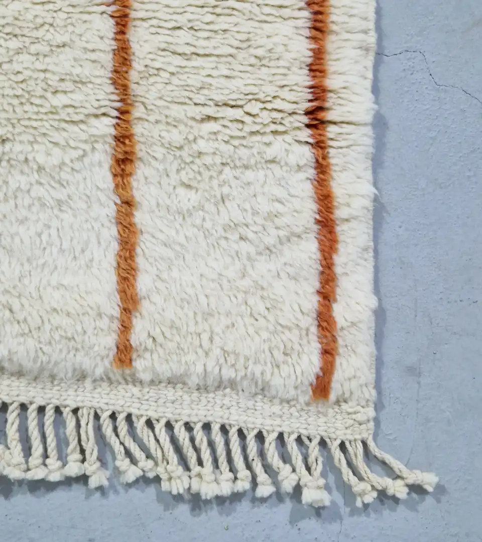 Modern ivory and orange Moroccan runner rug with linear chain design