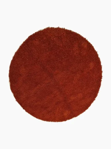 Hand knotted wool round rug 6ft in rust orange