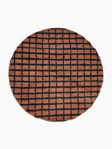Hand knotted wool round rug 8ft in terracotta and black